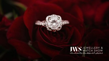 Engagement ring with roses on the background