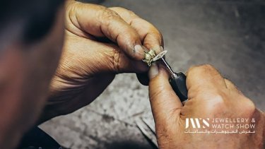 a piece of jewellery going through polishing 