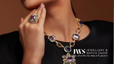 Necklace, ring, and earrings inspired from the look of ortensia flowers with emeralds, diamonds, kunzite, and tanzanite stones 