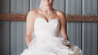 Bride wearing gown with a simple but elegant pearl necklace and earrings