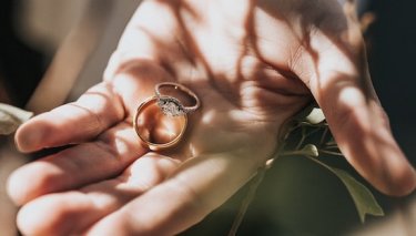 Diamond jewellery on open palm