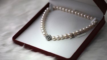 Pearl necklace in a red box