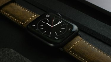 Smart watch with brown strap