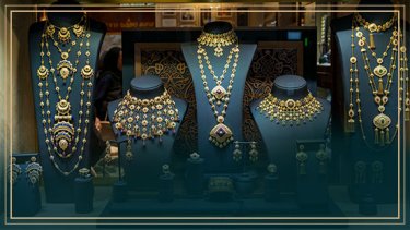 An image of gold necklaces
