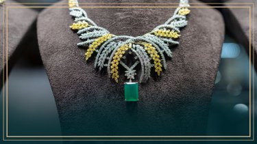 An image of yellow, white, and green necklace
